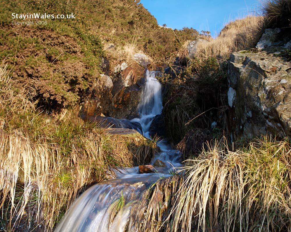 Mountain stream running into Claerwen Reservoir