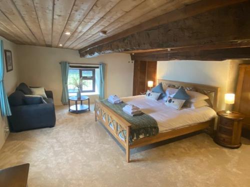 Master bedroom with Super King bed (and low beams)