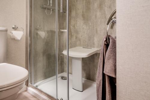 Folding seat in en-suite shower room