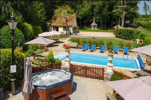 Hafod Lodge and grounds with pool