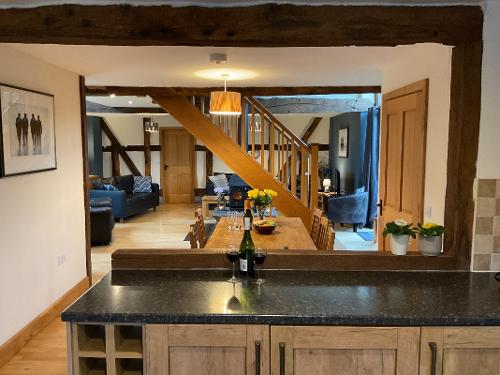 Open plan kitchen/ dining room and lounge for family get togethers.