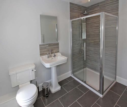 The first floor shower-room with a generously proportioned walk-in shower.