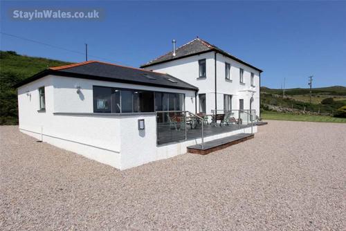 Llwynfor, dating from the late 1920s, is spacious self catering house in its own generous grounds, w