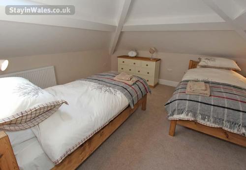 Twin bedroom on the second floor, ideal for children. This floor also has a small sitting room and a