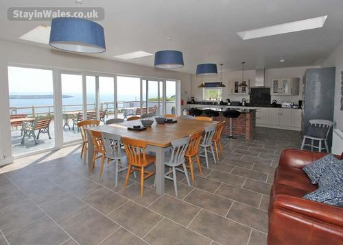 The kitchen-diner is light and airy with a huge picture-window, and exceptionally spacious, and can 