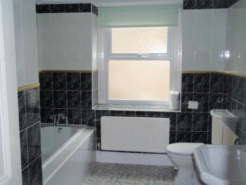Modern family bathroom with separate shower cubicle