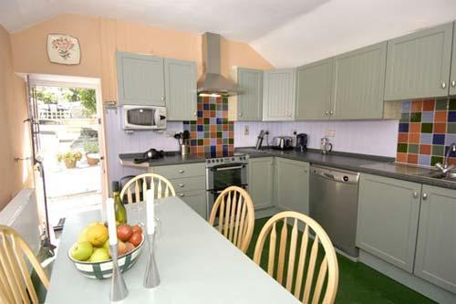 Well equipped kitchen in which (per our visitors book) even Jamie Oliver would feel at home.