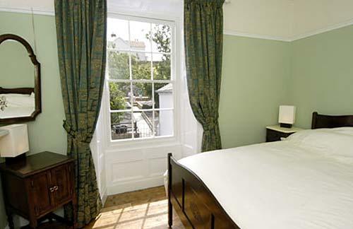 The Green Room upstairs with beautiful views over garden and terrace.