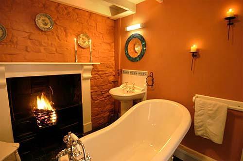 Soak away the day in a fire-lit soak in the roll-top slipper bath.