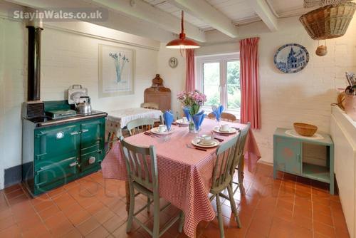 An oil-fired Rayburn keep the kitchen warm in winter and powers the central heating