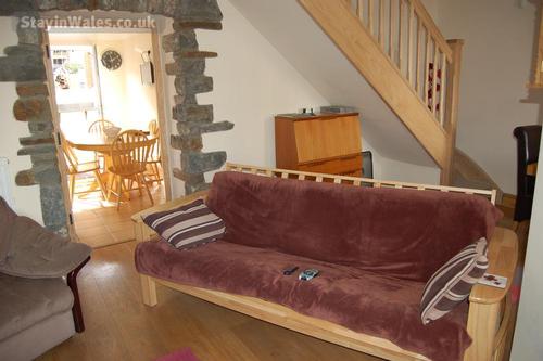The Lounge is furnished with a comfortable 3 piece suite, nest of tables, and writing bureau. The lo