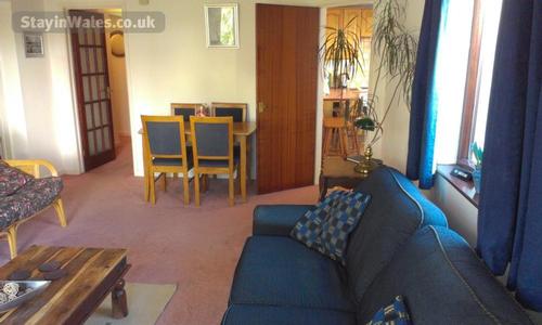 Dining Area with Kitchen through door