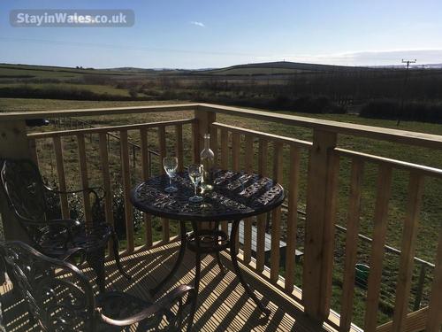 Enjoy the views across open country side and sea with your favourite tipple
