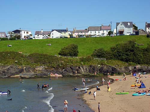Aberporth beach with Ogof Lludw in the background