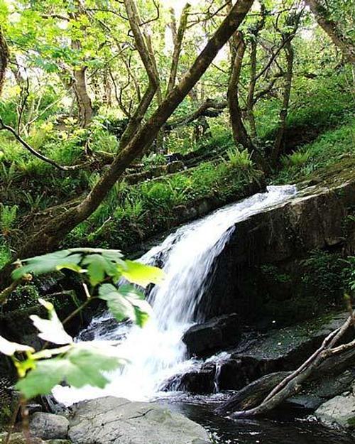 Visit this waterfall en-route to the beach.