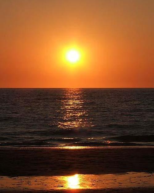 Stunning sunset on local beach.