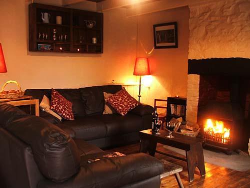 Cosy log fire, comfy sofas and lots of books and games.