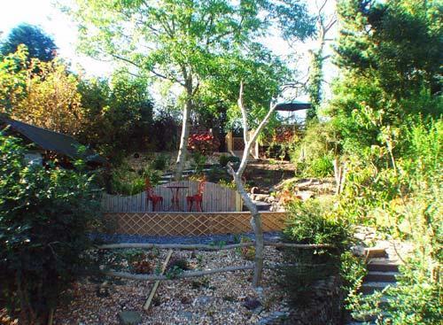 The stunningly landscaped garden is private and has sunshine all day long.