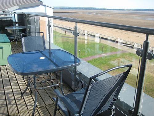 Sunny balcony overlooking the beach