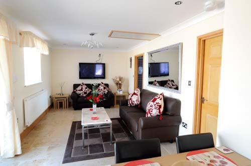 The lounge area of Winchfawr Lodge.