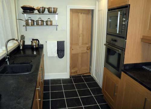 Kithen with fridge inc. freezer compartment, dishwasher, hob, double oven, washer drier