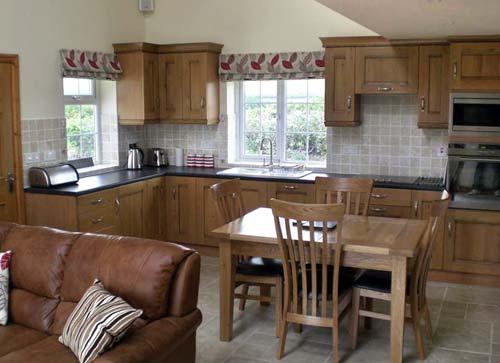 The fully fitted kitchen and dining area