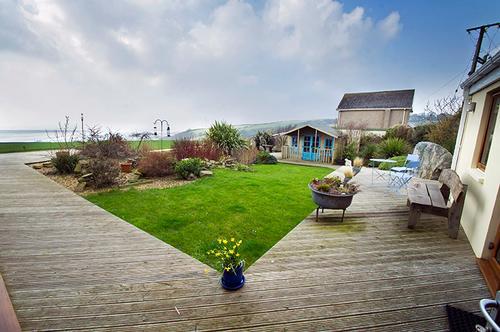 Relax in the garden overlooking Carmarthen Bay