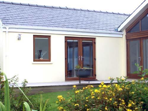 Hen Beudy, the annexe to Parcmaenllwyd Farmhouse, is surrounded by fields and has an uninterrupted s