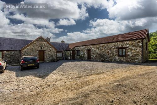 The Tractor House (property on the left)