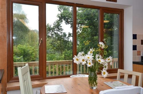 Dining area with French doors to balcony