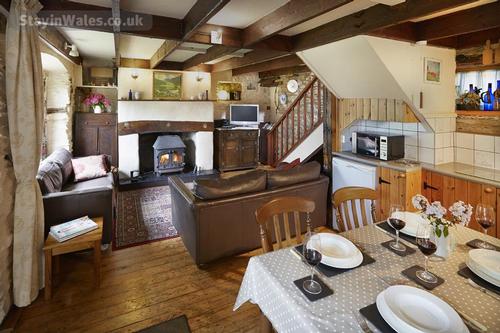 The Handmade kitchen is extremely well-equipped and the 2 comfortable cosy couches in front of the l