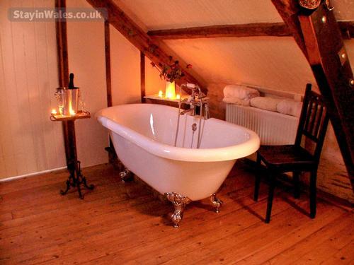 Soak in the double-ended rolltop bath, bubbles provided.