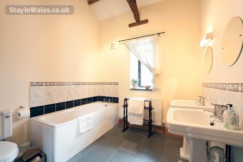 The main bathroom is adjacent to the two ground floor bedrooms