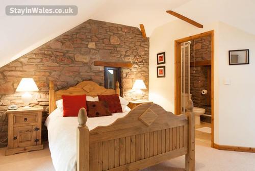The first floor master bedroom has an en-suite shower room