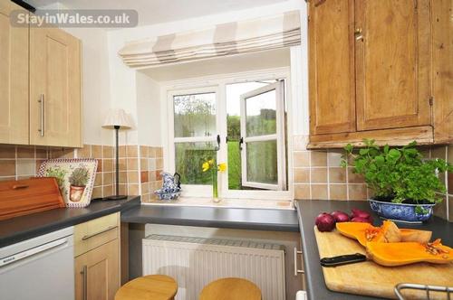 Kitchen breakfast bar with riverside views