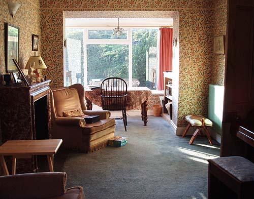 The living room, there is also a west facing conservatory, overlooking the garden.