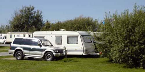 Pitches for touring caravans are also available