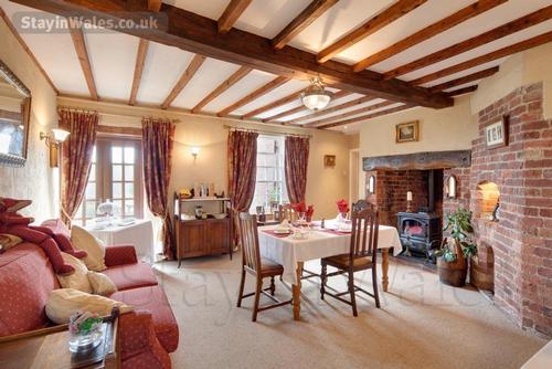 The guest dining room, with a woodburner for cosy winter mornings