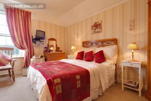 Our spacious and stylish family room has a double and a single bed