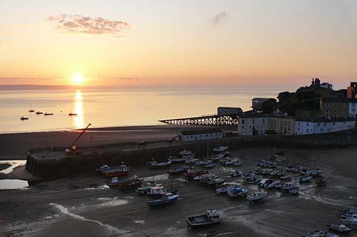 Sunrise over Tenby Harbour, see from Harbwr Apartment