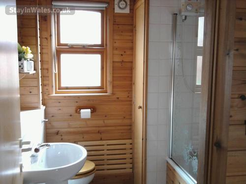 Bathroom with bath and shower