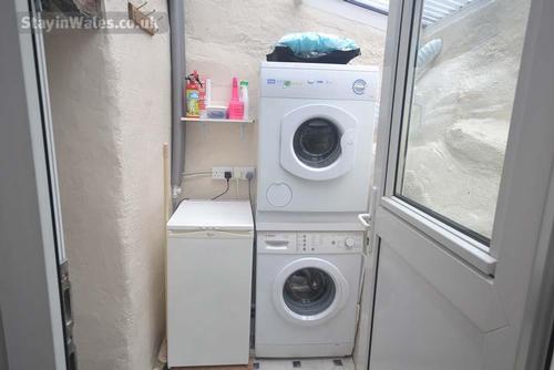 Utility room with washer and dryer