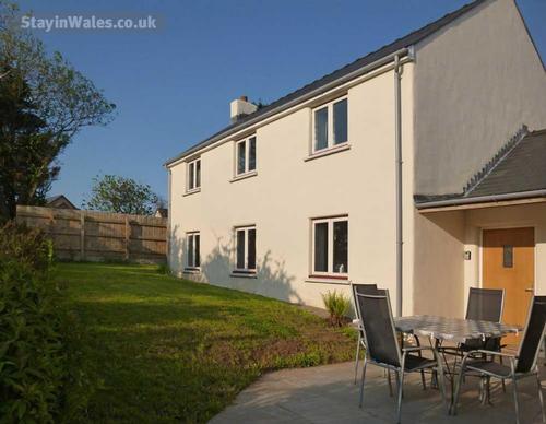 Private rear garden with patio area