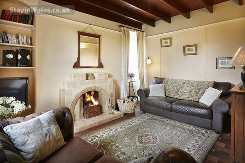 Lovely fire in the lounge perfect to cosy up in after a day on the coastal path