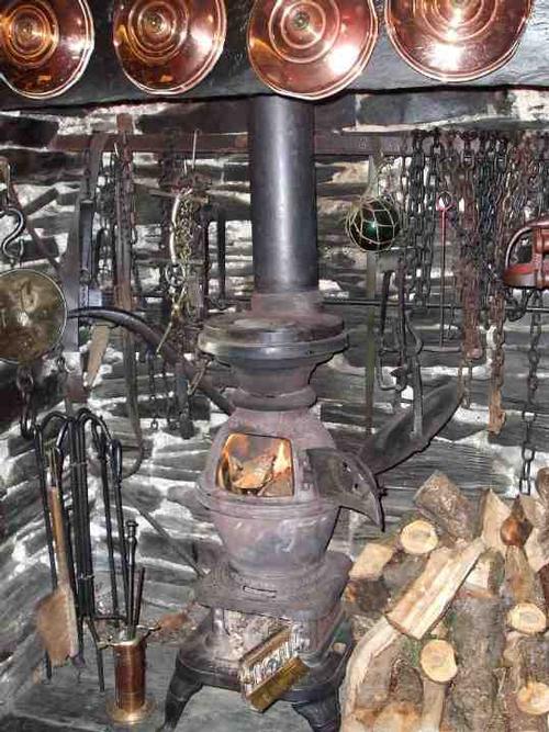 The pot-bellied log stove in the bar