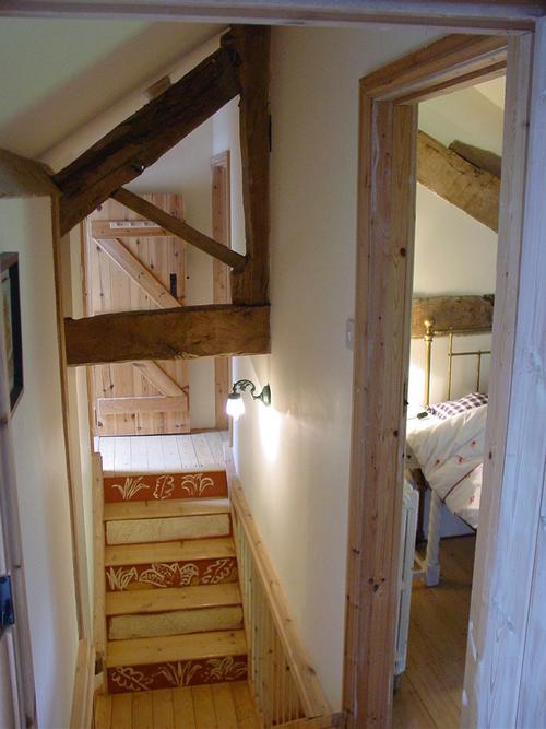 painted stairs go under the king post truss