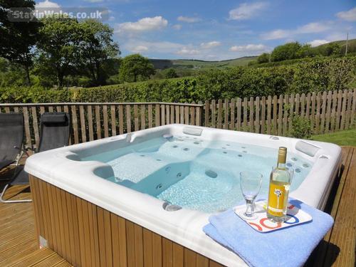 Private hot tub overlooking fields and countryside