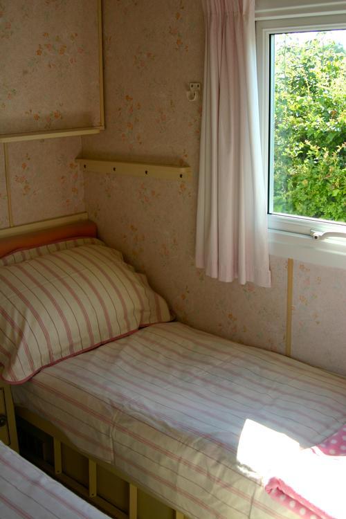 Two singles with child's bunk folded above