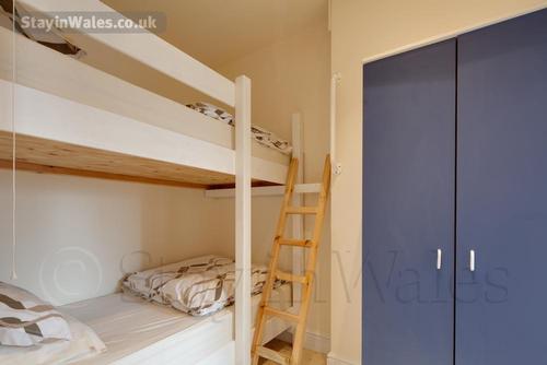 Twin bunks, suitable for children or adults, in one of the family rooms