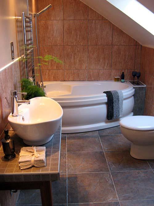 Family bathroom with whirlpool bath
